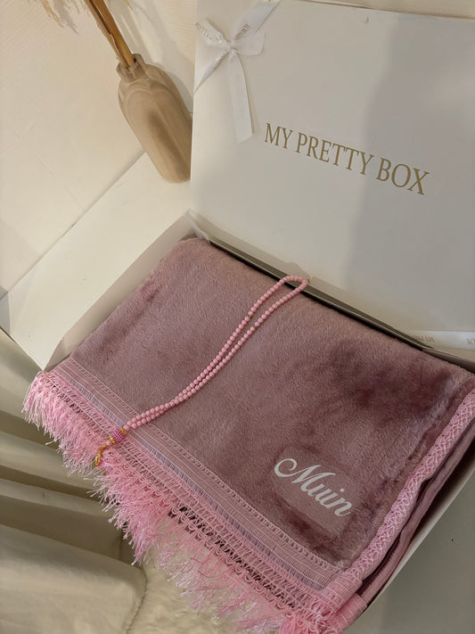 Tapis rose avec chapelet